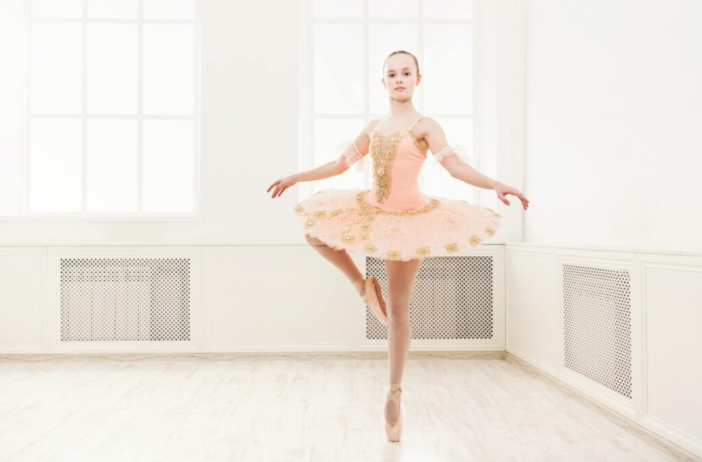 ballet student exercising in ballet costume.jpg